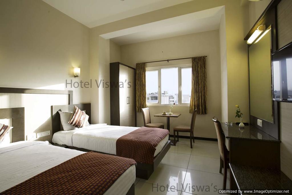 Hotel Viswas Тируппур Номер фото
